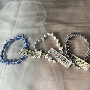 Stretchy giraffe and elephant bracelets.